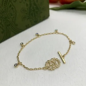 Alternative view of 18k Yellow gold plated GG bracelet with small stones