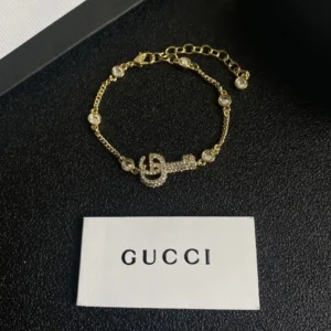 18k Yellow gold plated GG bracelet with stones and gg logo