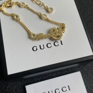 Alternative view of 18k Yellow gold plated GG bracelet with stones and gg logo
