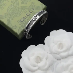Alternative view of 18k White gold plated GG bangle with black middle stripe and gg logos slip on
