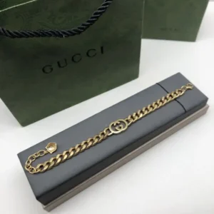 Alternative view of 18k Yellow gold plated GG curb link bracelet with gg logo in the middle