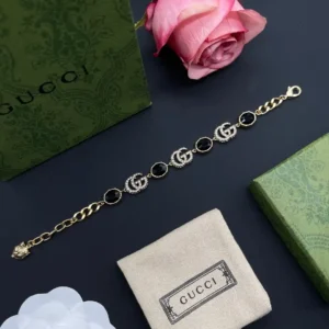 Alternative view of 18k Gold plated GG bracelete with black, red or whites stones