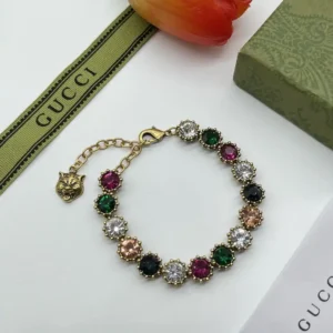 18k Yellow gold plated GG bracelet with multiple coloured stones