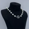 18k White gold plated GG pearl necklace with white gold logo