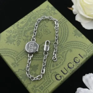 18K White gold plated GG thin curb link bracelet with round disk in die centre