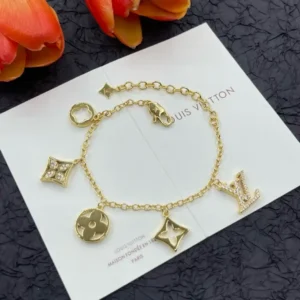 18k Yellow gold platedd LV bracelet with 5 charms and stones