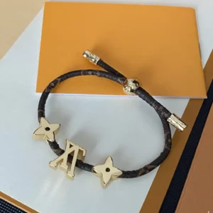 Alternative view of 18k Yellow gold plated LV black and brown rope bracelet with flowers and gold charm
