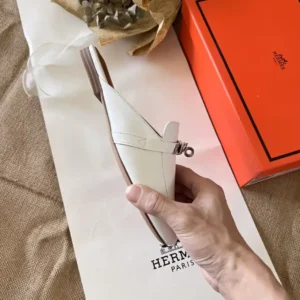 Alternative view of HM White slip ons