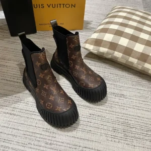 LV Brown boots with lv signage