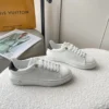 LV White plain sneakers with embossed logo